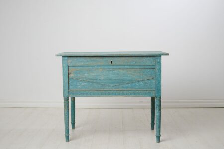 Antique Swedish country table from the late gustavian period around 1810. The table has original blue paint - blue is an unusual colour
