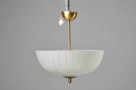 Vintage Swedish ceiling light from around the 1940 with a cover in glass and suspension in brass. The light has three light sources