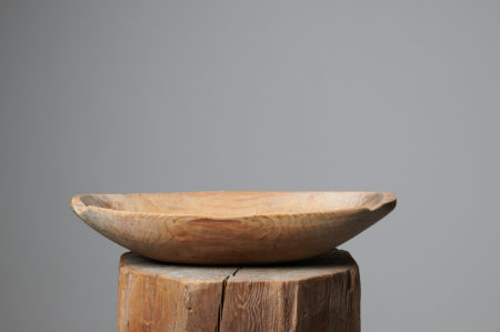 Antique wood trough bowl in folk art from Sweden made during the mid 1800s, around 1850. The bowl is a utility item which was used daily