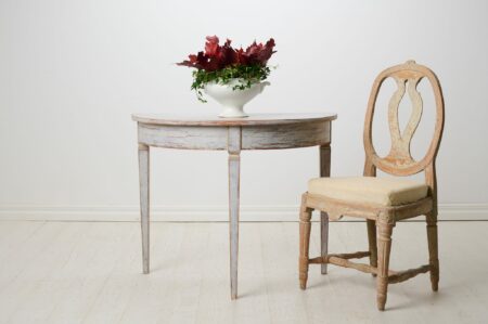 Antique Swedish demi-lune table from the mid 1800s. The table is freestanding and made by hand in solid pine in northern Sweden around 1850