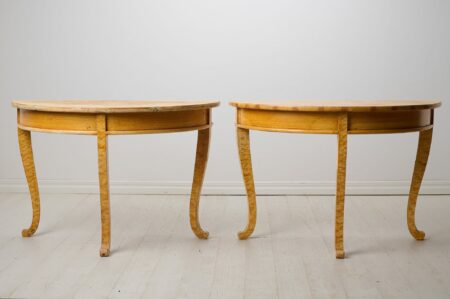 Antique demi-lune table from Sweden. The table consists of two half-circles, or demi-lunes, made by hand in solid pine in northern Sweden