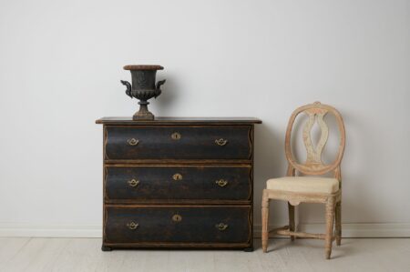 Swedish antique chest of drawers dated 1883. The chest is a country house furniture with three drawers in well-working condition.