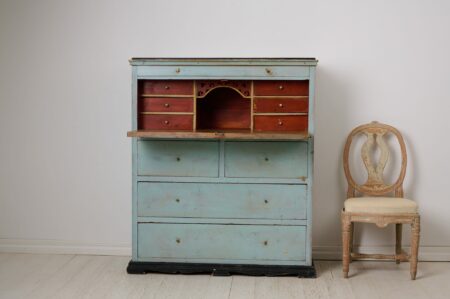 Antique folk art secretary desk from northern Sweden made by hand in solid pine around 1850. Untouched original condition with unusual light blue paint.