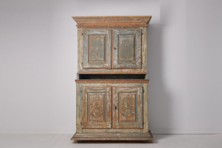 Antique Swedish baroque cabinet. The cabinet is a genuine Swedish country house furniture from the late 1700s. It is a proper statement piece