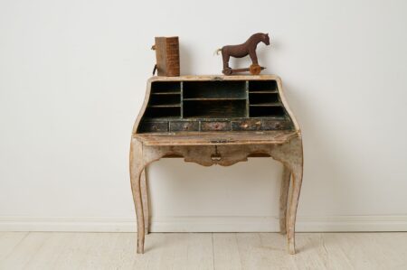 Antique period rococo secretary desk from the late 1700s. This Swedish antique is made by hand in solid pine with elegant proportions