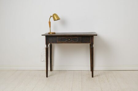 Antique Swedish empire desk made by hand in solid pine. The desk is from the empire period in northern Sweden around 1850.