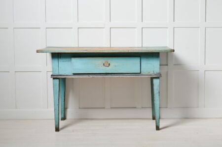 Folk art turquoise table from the 1800s. This antique table is made in northern Sweden around 1850. Classic gustavian straight shape
