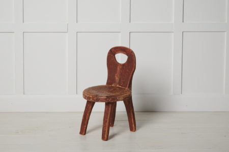 Unusual primitive children's chair in folk art from northern Sweden. The chair is made around 1820 to 1840 and is a unique piece made by hand
