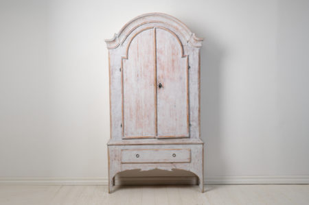 Antique grey rococo cabinet, a genuine rustic Swedish country house furniture. Transform your space with the timeless allure of this Northern Swedish antique rococo cabinet from Jämtland