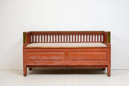Rare folk art bench or sofa from northern Sweden, unusually well-crafted with decorative panels and sculpted legs. Handcrafted in solid pine