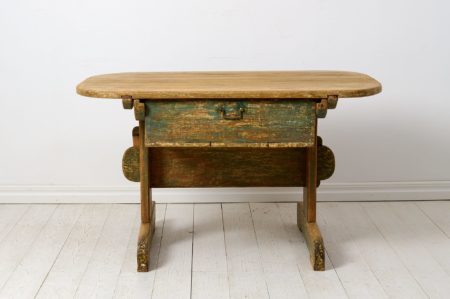 Antique charming country table from northern Sweden. The table is a rare and unique table with a drawer from the late 1700s