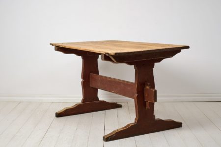 Antique rustic dining table or work table from northern Sweden, made around 1820. The table has a frame in solid pine that's made by hand