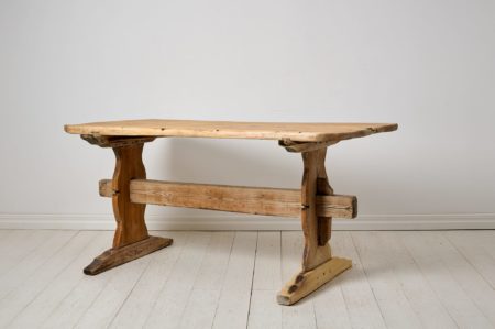 Folk art trestle table, dining or work table from northern Sweden. The table is a genuine antique and made unusually sturdy and