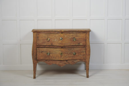 Rare genuine antique Swedish rococo chest of drawers from northern Sweden. The chest is made by hand in Swedish solid pine around 1770.
